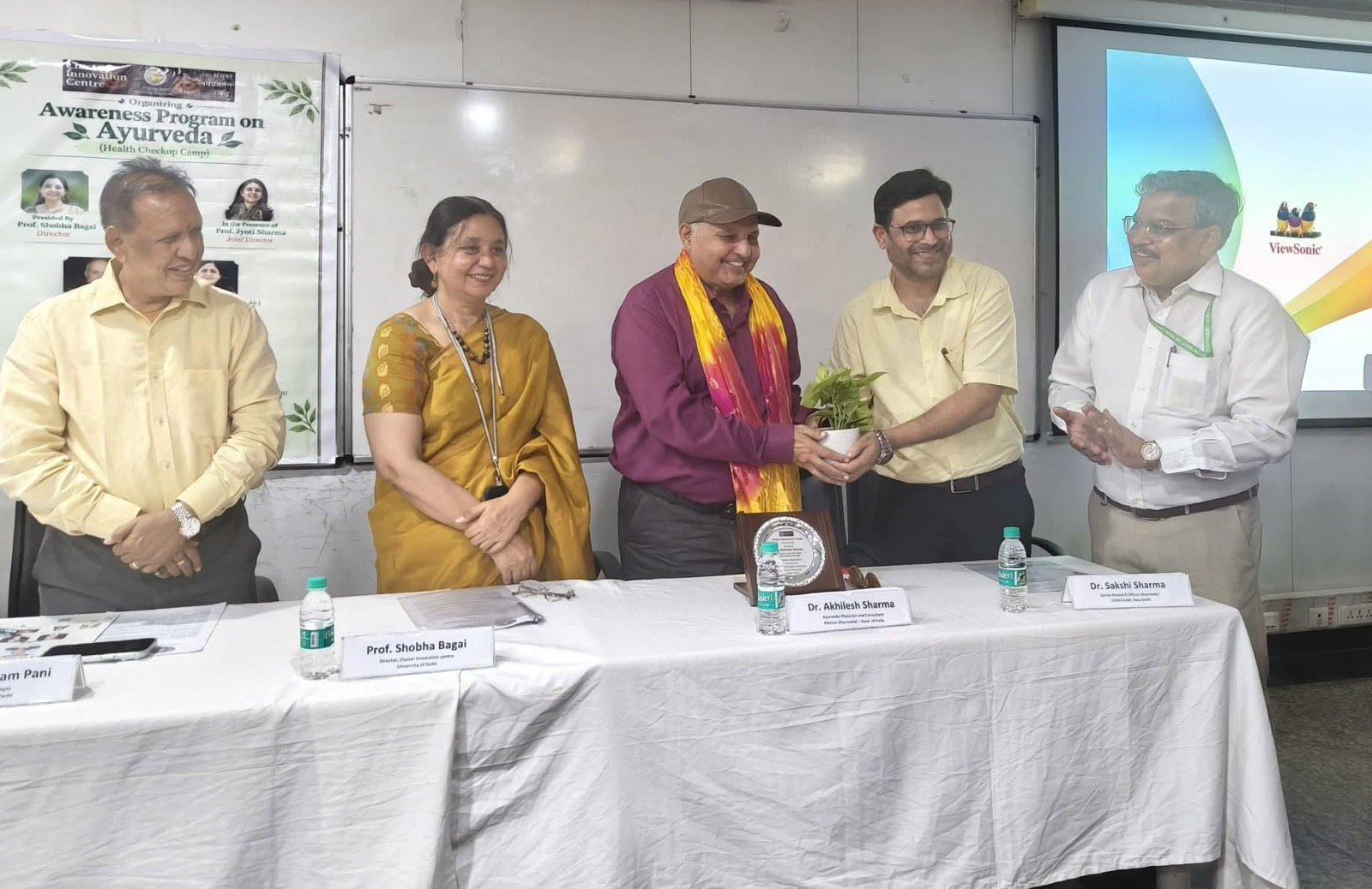 Plant presentation during the Ayurveda awareness and health checkup programme at CIC